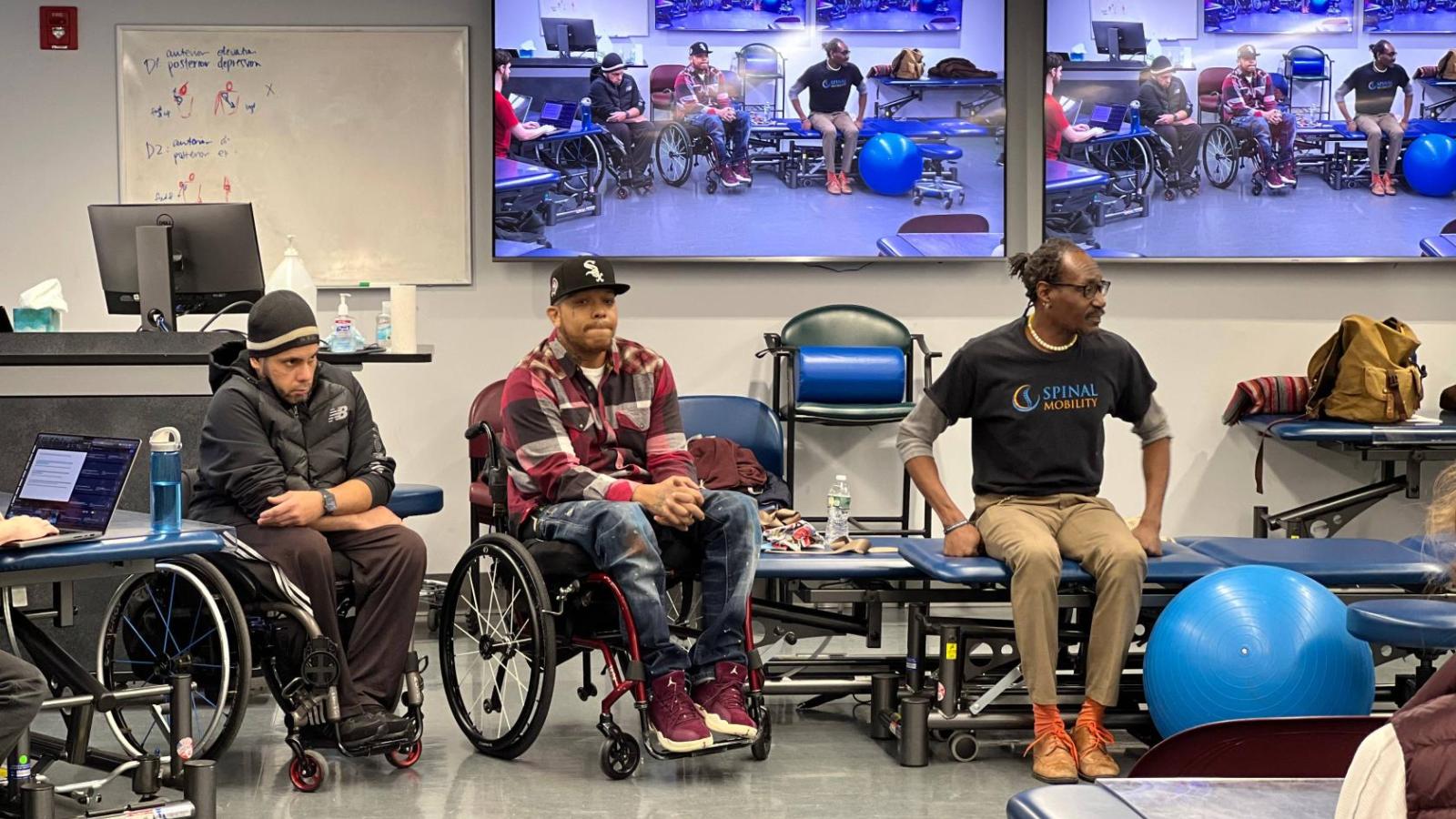 Lawrence answering a question asked in class.