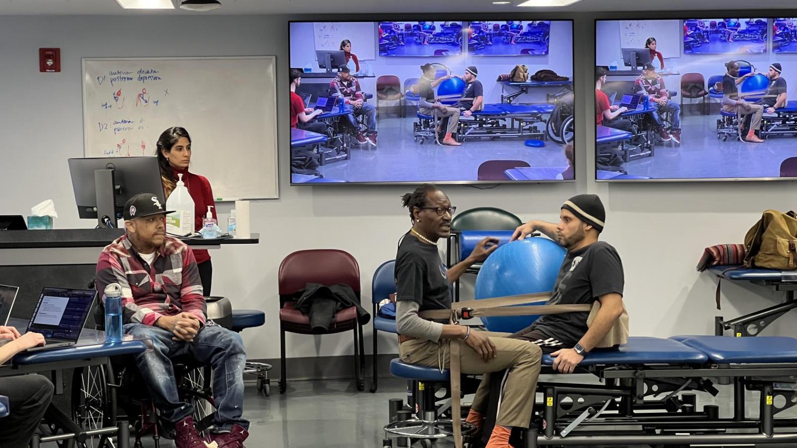 Lawrence working with a patient.