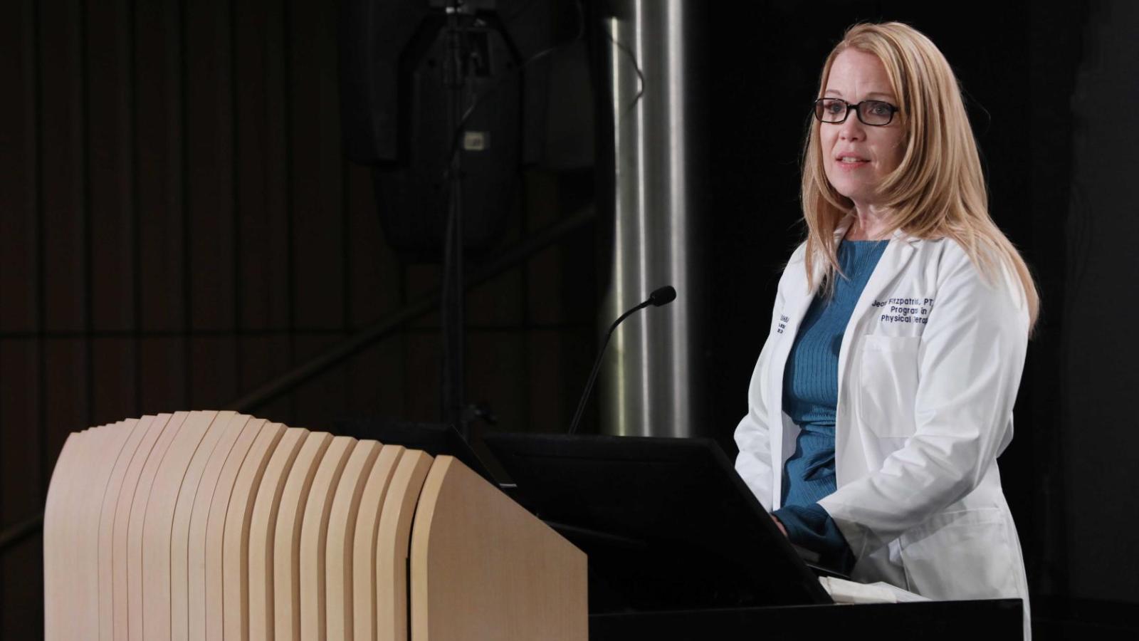 Jean Fitzpatrick, Director of the Programs in Physical Therapy at Columbia University, speaks at a white coat ceremony.