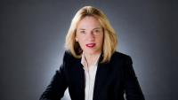 Studio headshot of Janet Sparr in a dark blazer.