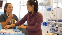 Female medical students train in the Simulation Center in the Vagelos Education Center.