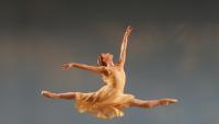 A ballerina leaping in the air