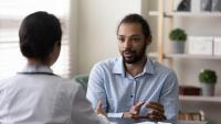 Male patient talking to his doctor