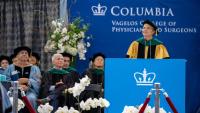 Katrina Armstrong, Interim president of Columbia University, at the 2024 Columbia University Commencement, with Anthony Fauci and other Columbia prominent faculty in the background.