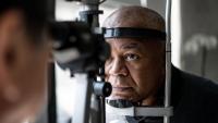 An ophthalmologist examining a patient's eyes