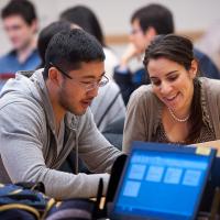 Students looking at a computer screen.