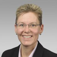 Headshot of Stacy Kinirons