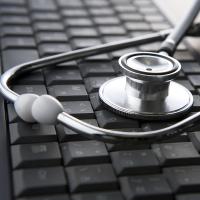 A stethoscope on a keyboard.