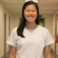 Lauryn Hayashi standing in hallway