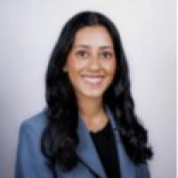 Portrait of Arshia against a plain background.